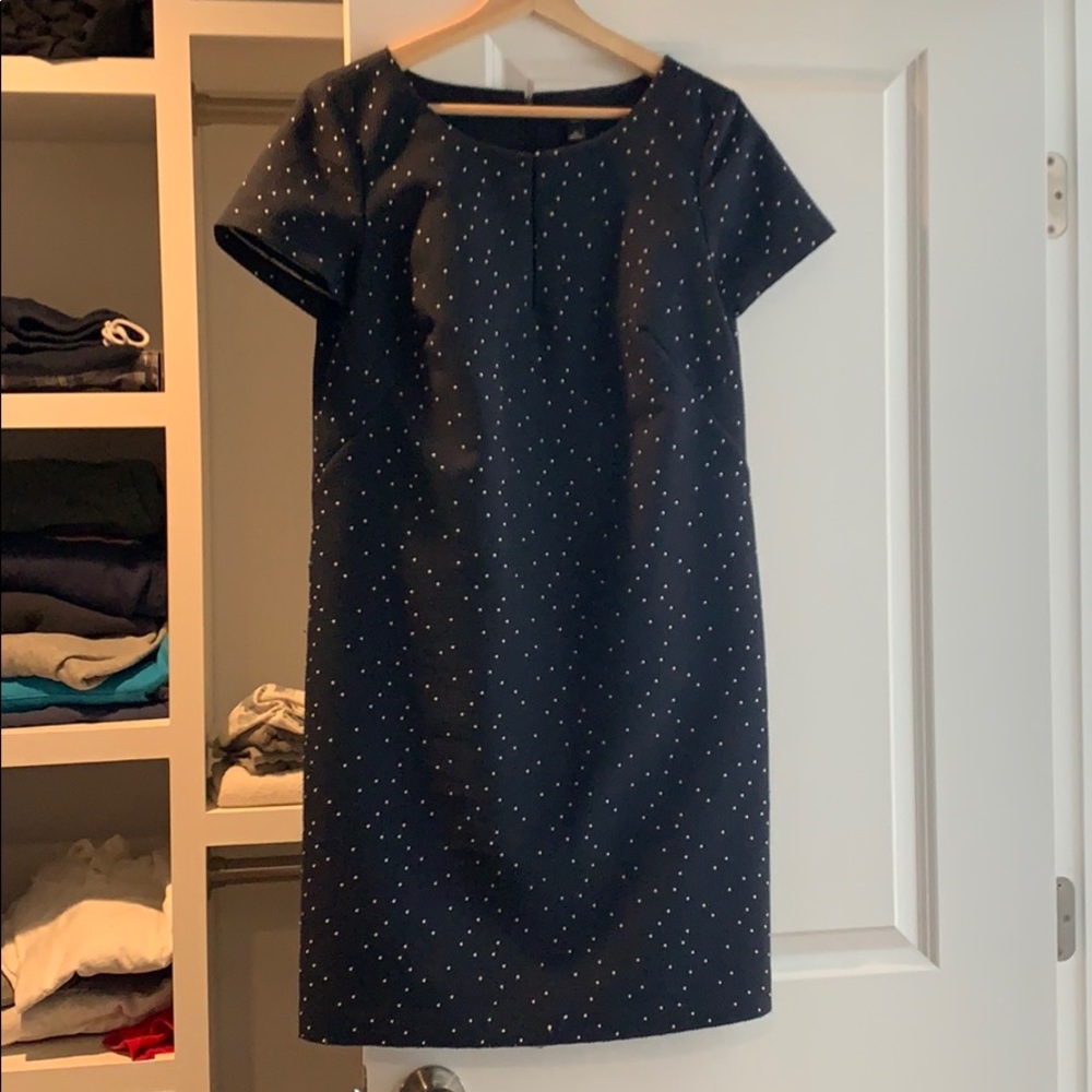 Navy dress with tiny white polka dots and keyhole